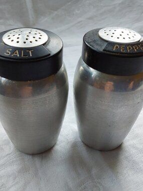 Retro Kromex salt and pepper shakers spun aluminum and bakelite
